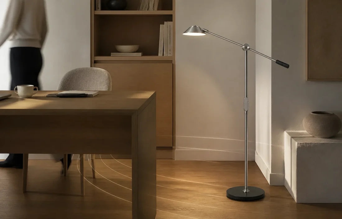 A person leaving a desk with SOLA Floor standing beside the workspace