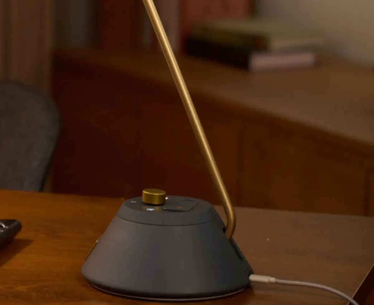 Physical rotary control and buttons on the SOLA Desk base